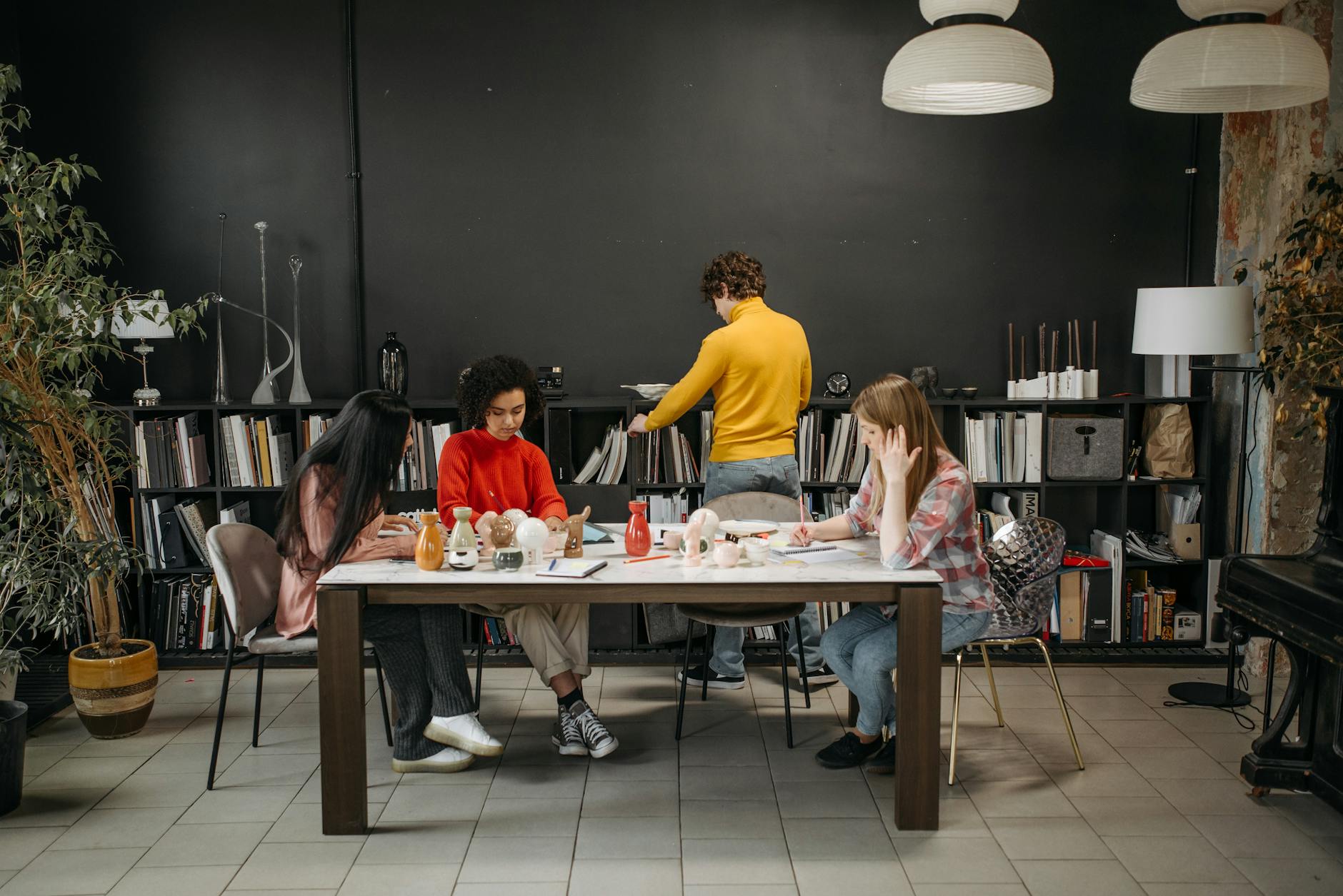 Diverse team of professionals collaborating in a stylish office space.